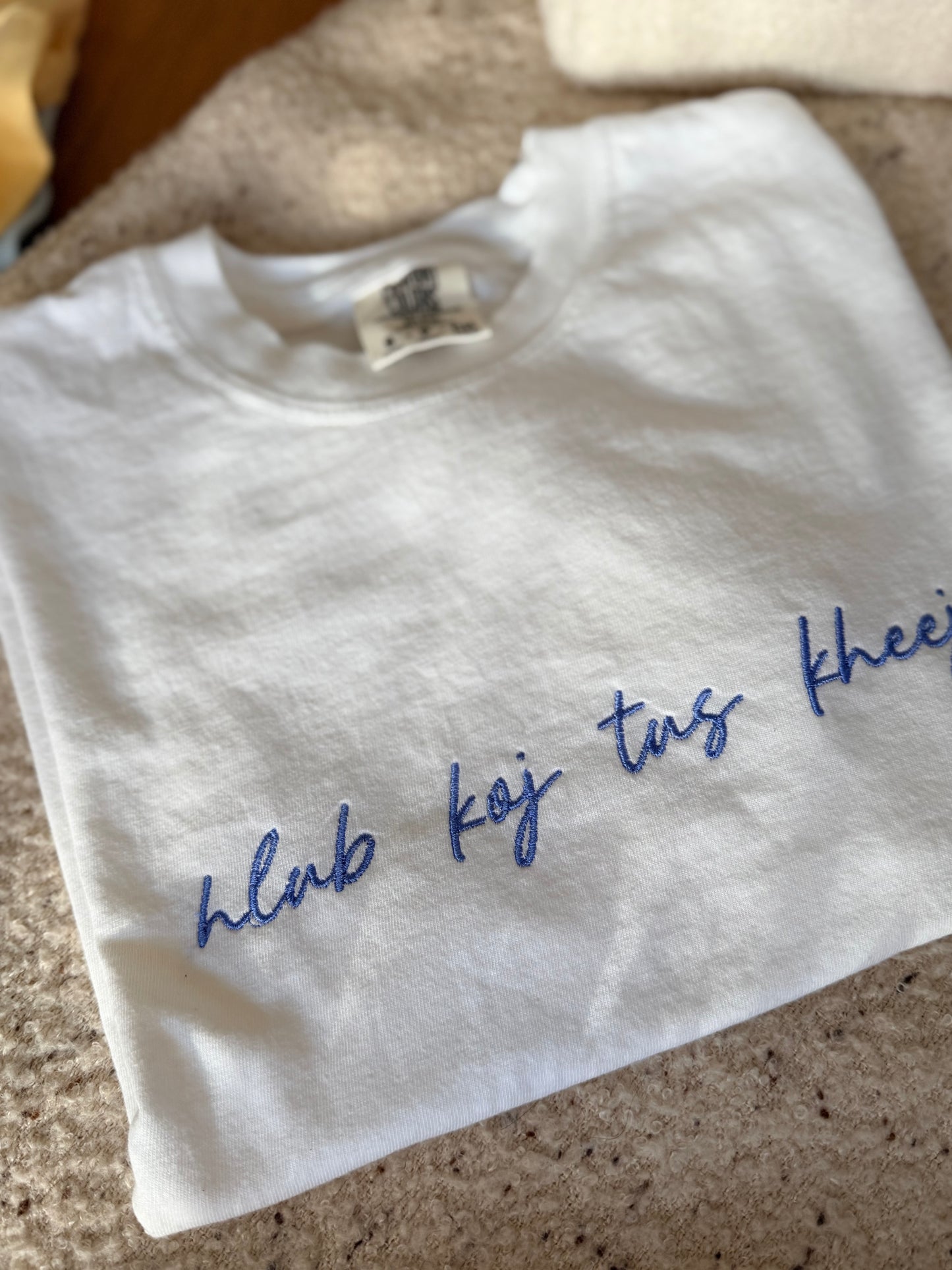 Hmong Phrase Embroidered Tee | “hlub koj tus kheej” | Custom Color + Thread
