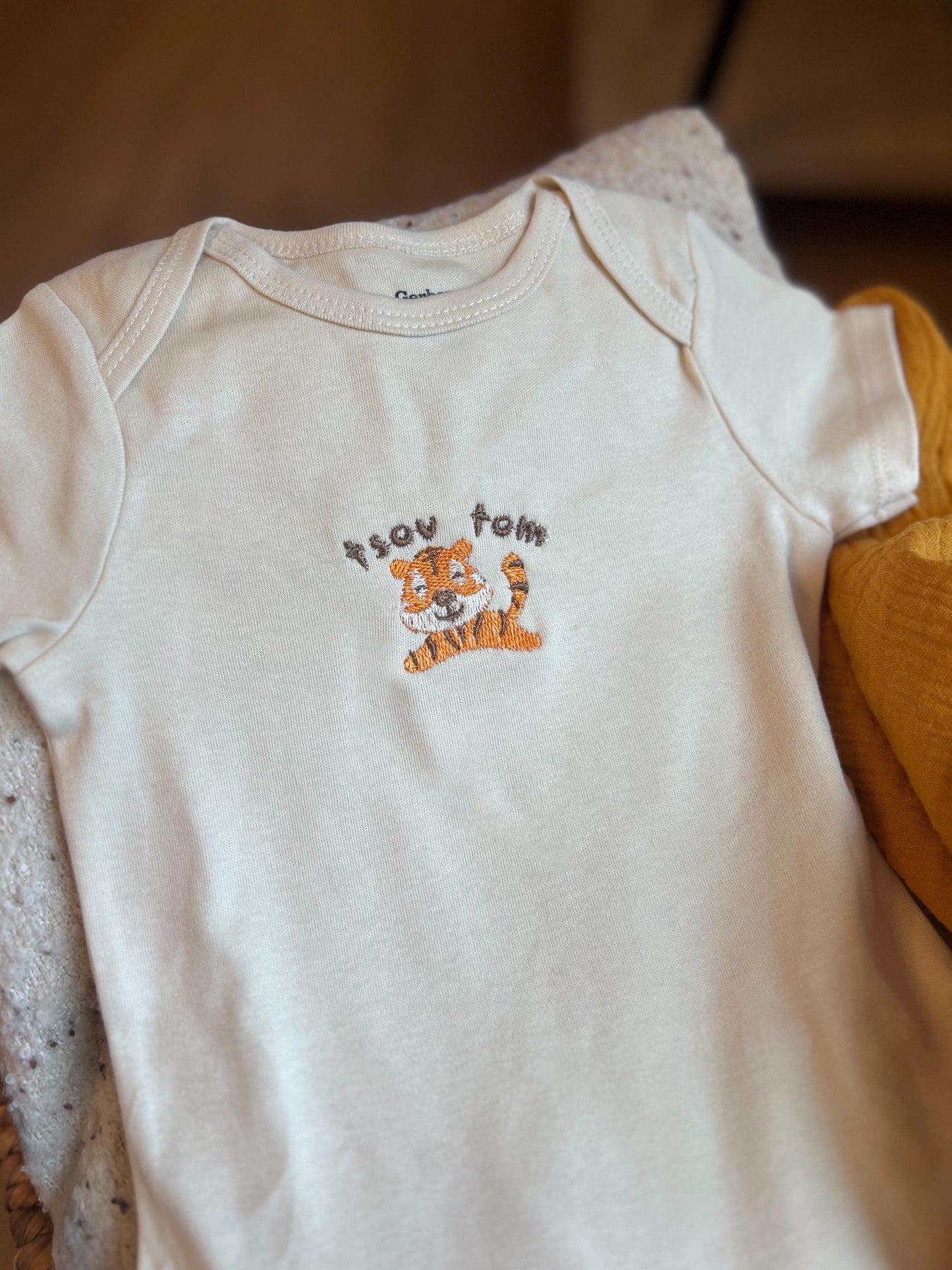 Tsov Tom (tiger bite) Hmong Infant Bodysuit